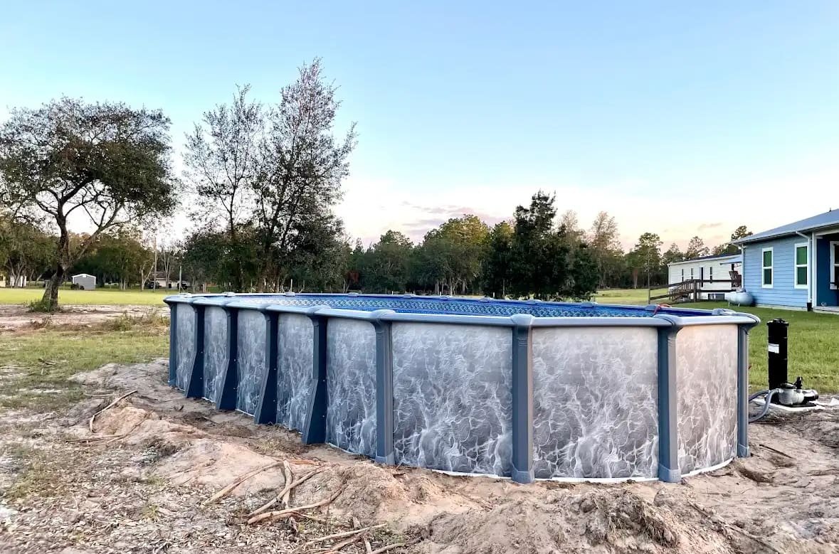 Above Ground Swimming Pools 9 An above ground pool in a customer's backyard