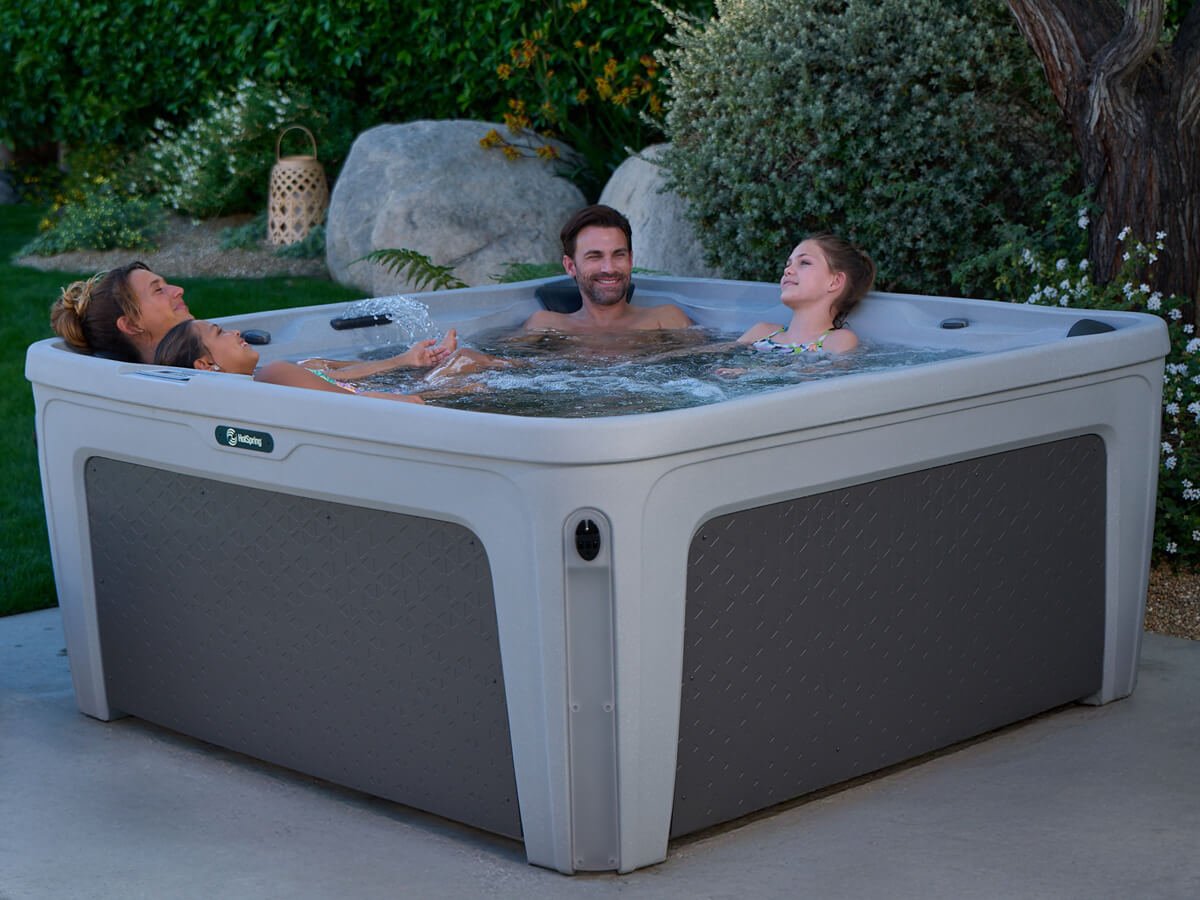 Portable Spas & Hot Tubs At Mr. Pool of Pasco & Crystal River 13 family sitting in Hot Spring Freeflow spa